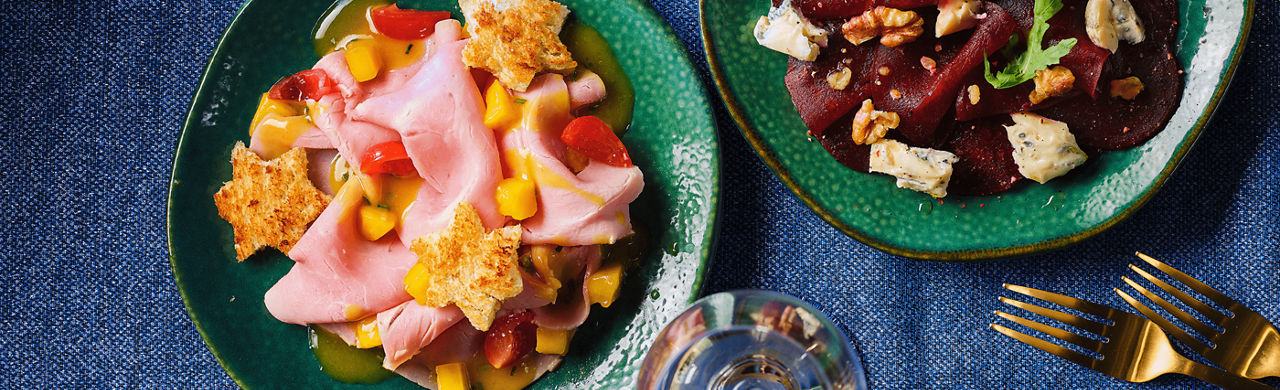 Beenham Carpaccio met mango en mosterddressing, gouden broodsterretjes en cherrytomaatjes ALDI