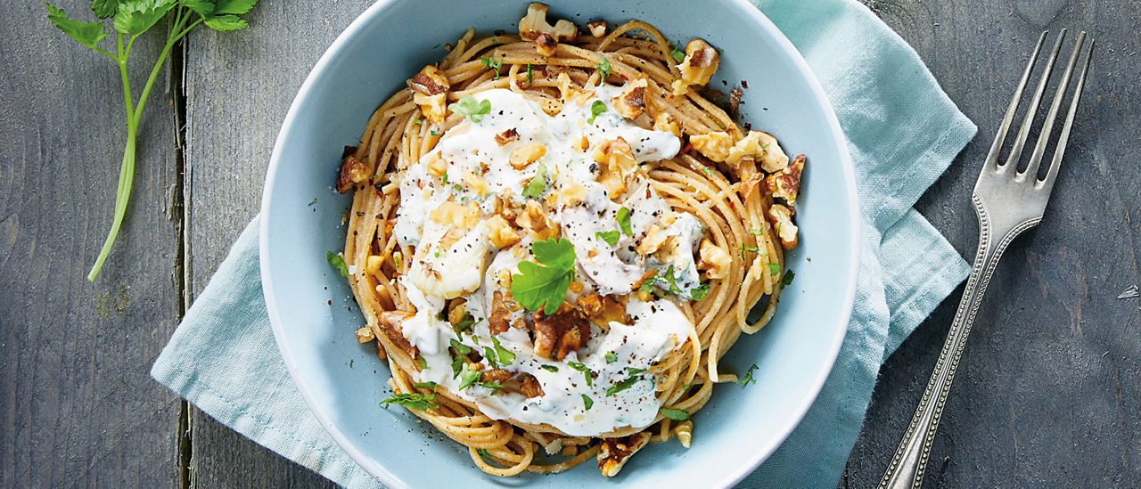 Romige pasta met champignons en walnoten