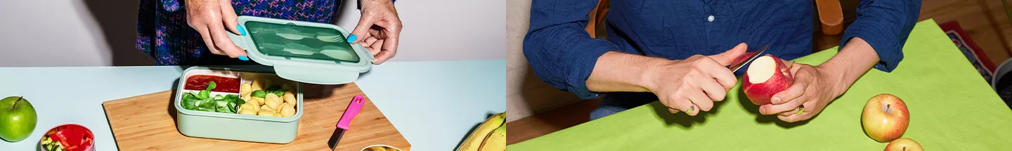 Person in blauem Hemd, die sich gerade einen Apfel mit einem Küchenmesser schneidet. 