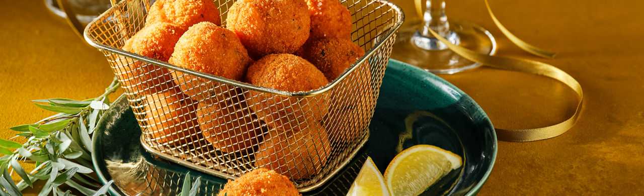 Vegan risottoballen met prosecco en citroen
