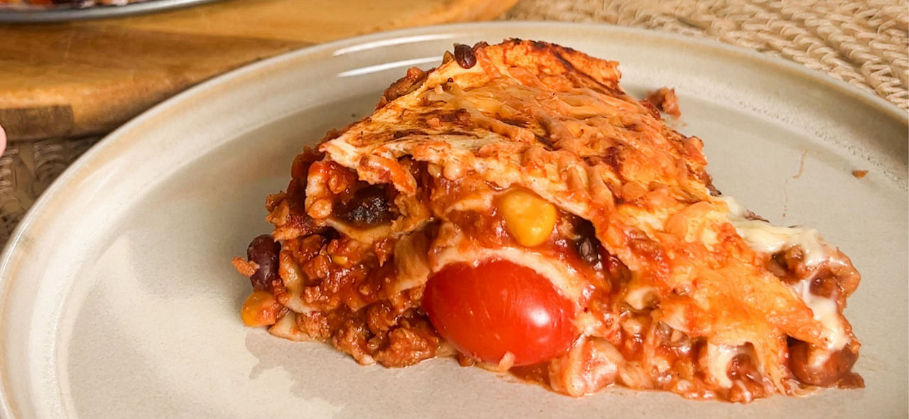 Lasagne met zalmsnippers en roomsaus en broccoli