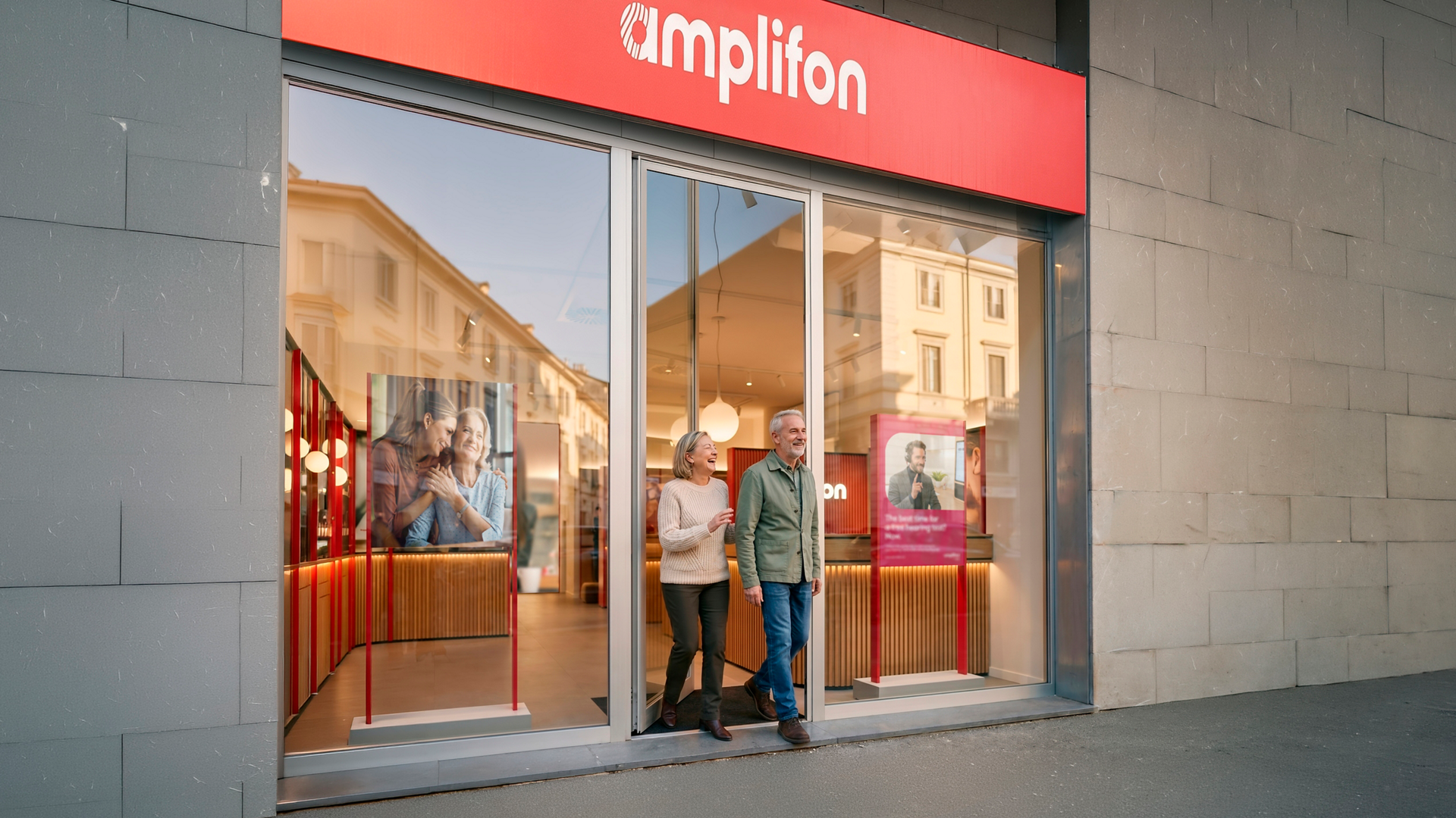 Senior couple leaving Amplifon hearing center