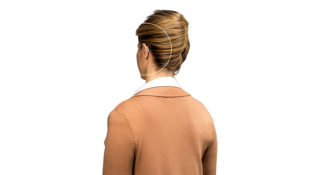 Woman viewed from behind in tan sweater