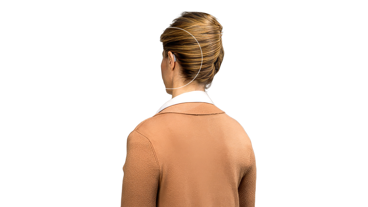 Woman viewed from behind in tan sweater
