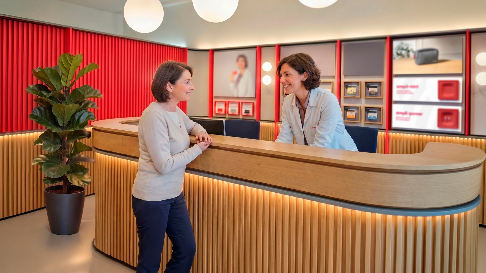 Modern reception desk with two women talking