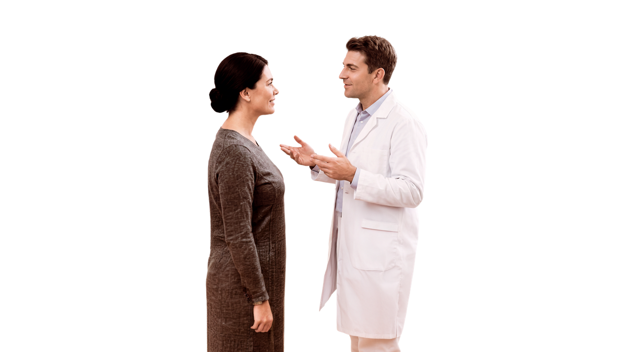 Doctor examining female patient's ear