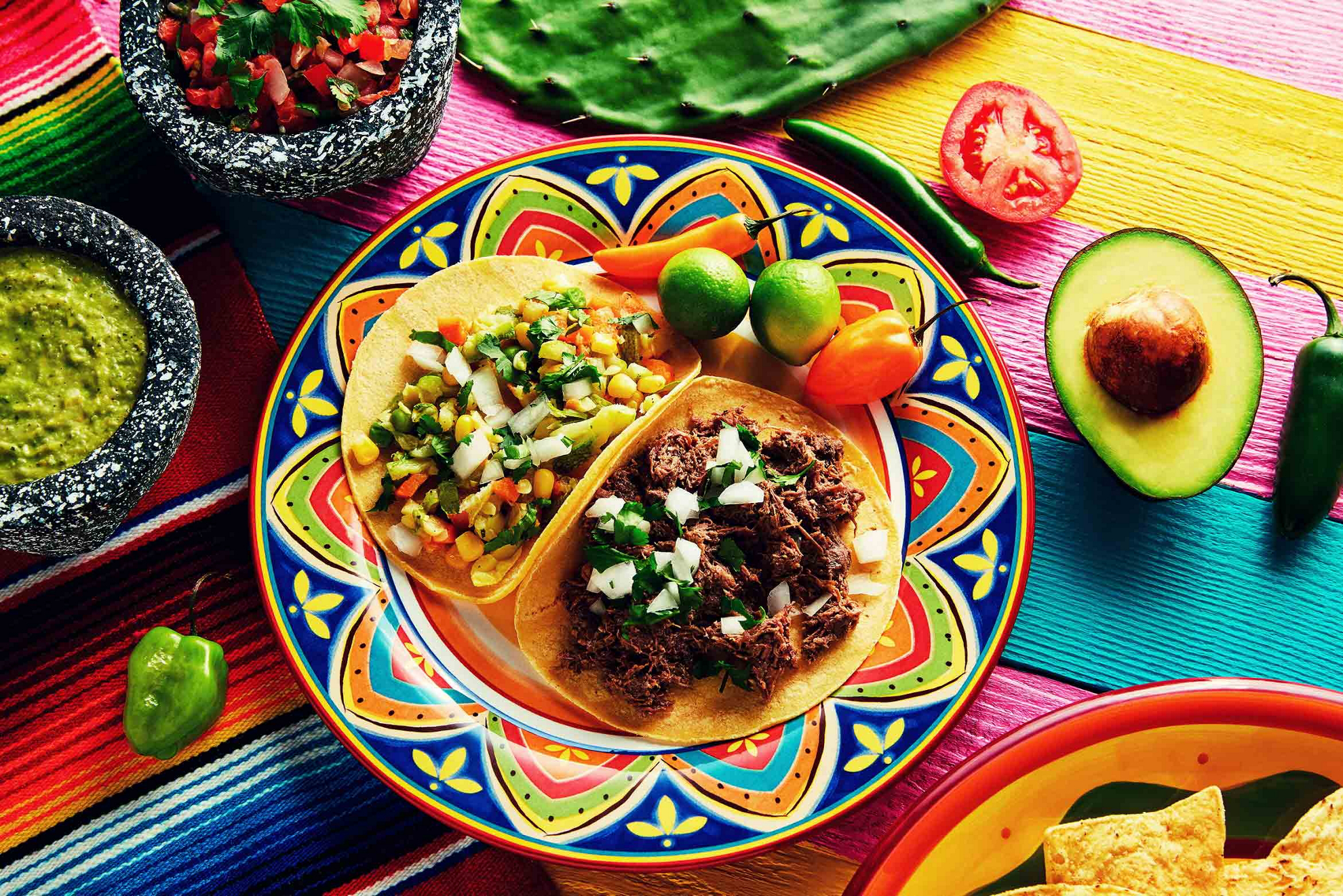 Tuck into a tasty plate of tacos on 5th Avenue Playa del Carmen