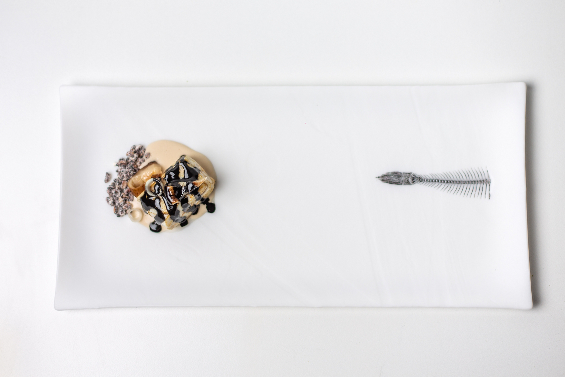 Stone bass with black sesame and white stone bass