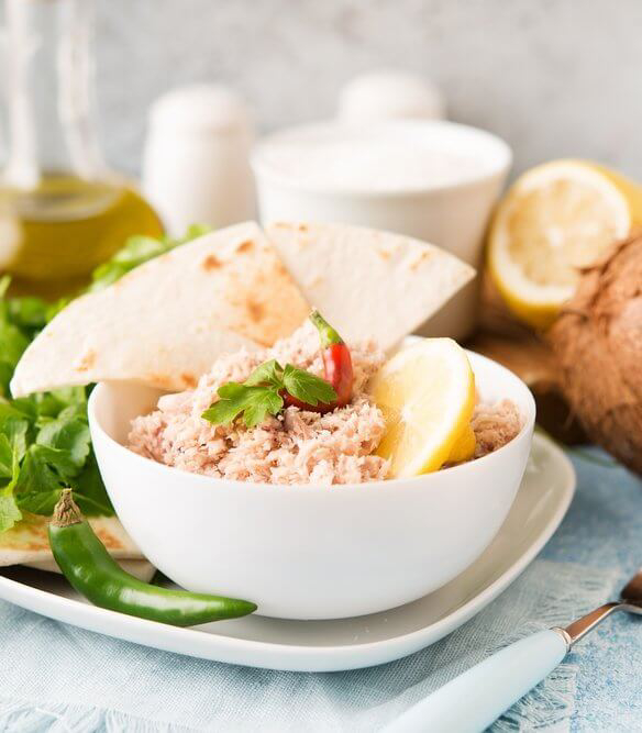 Traditional Maldives Cuisine: A white bowl full of traditional Mashuni salad