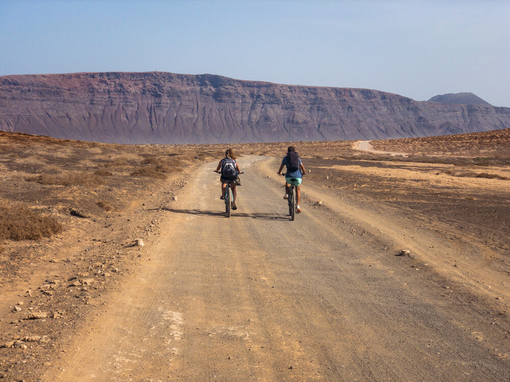 Cycling: Two people riding bikes in Lanzarote