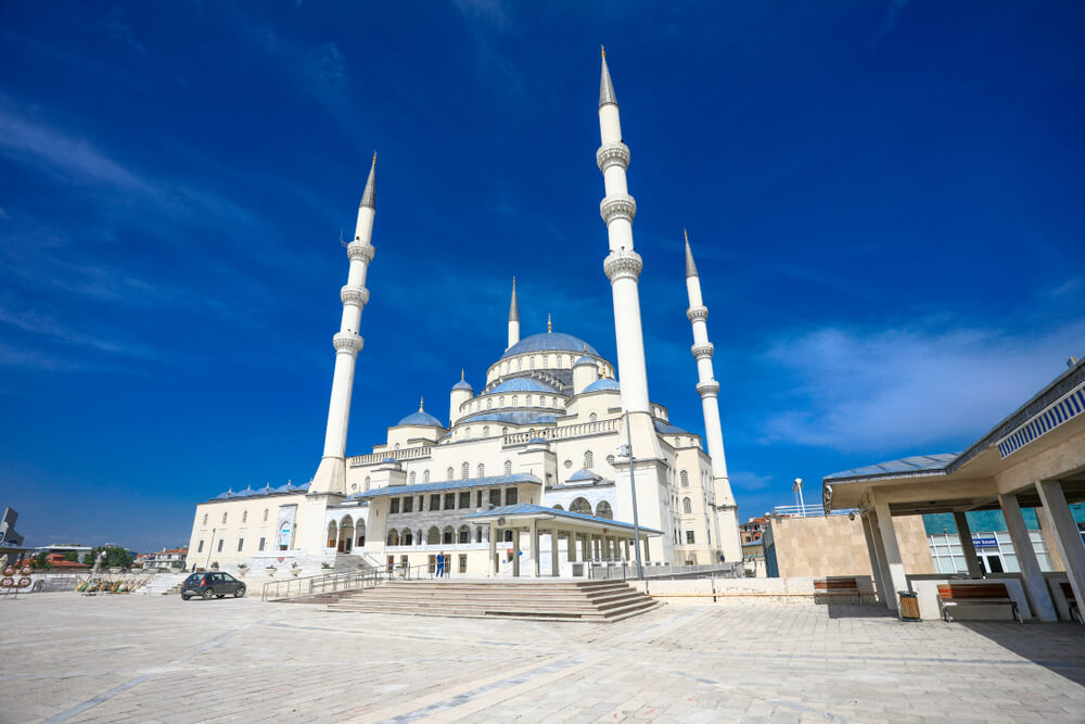 Kocatepe Mosque: A white mosque with a blue roof in a white square