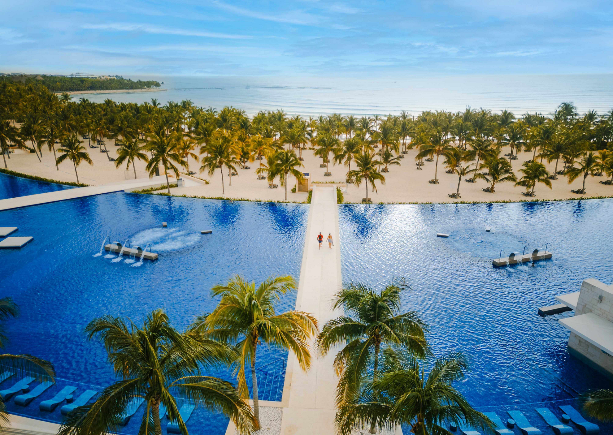 An aerial view of the walkway towards the beach at Barceló Maya Grand Resort.