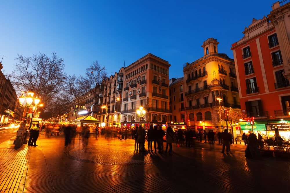 Barcelona nightlife: A view of the Rambla lit up at night 