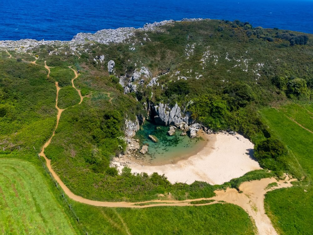This is one of many stunning beaches in Northern Spain: Gulpiyuri.