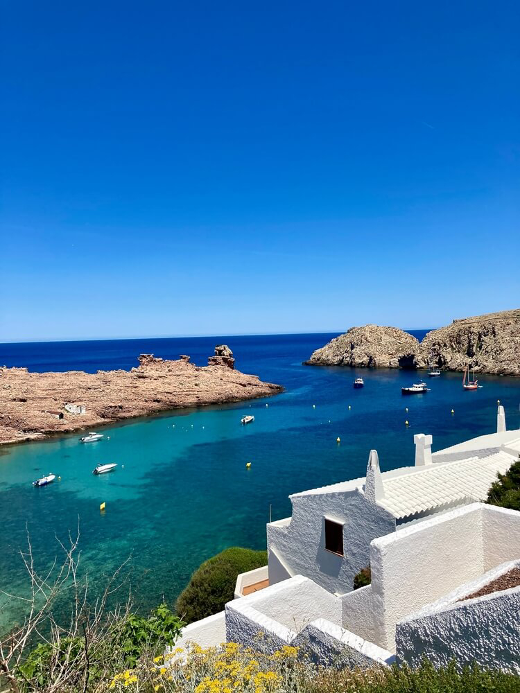 Best summer holiday destinations: A white building overlooking a rocky bay