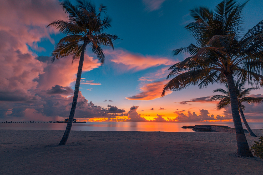 Catch amazing sunsets in the Caribbean, best enjoyed from the beach