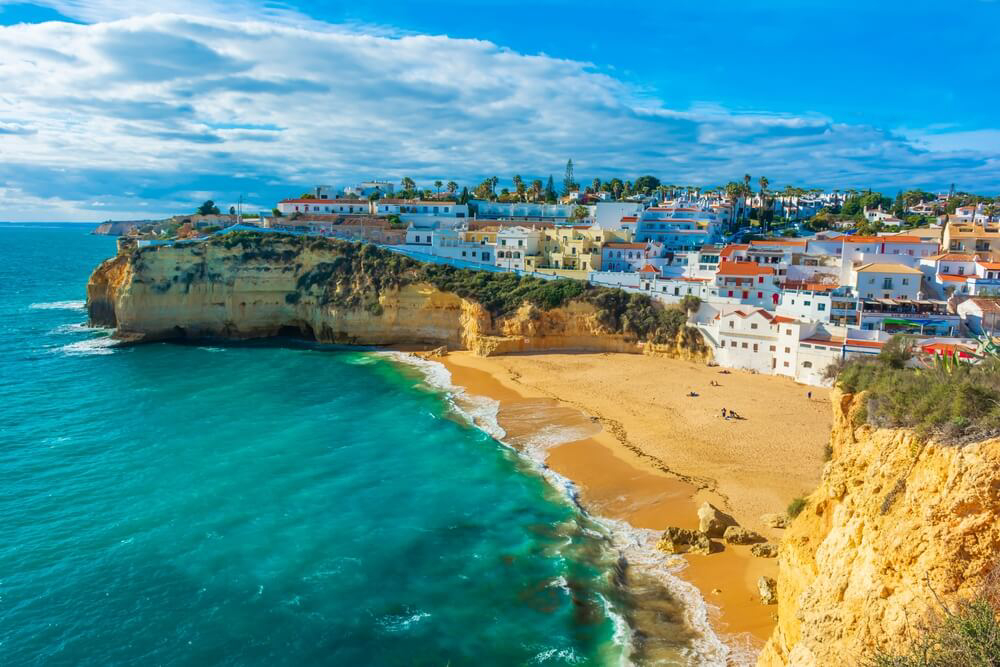 Best travel destinations: A golden sand bay in Faro, Portugal