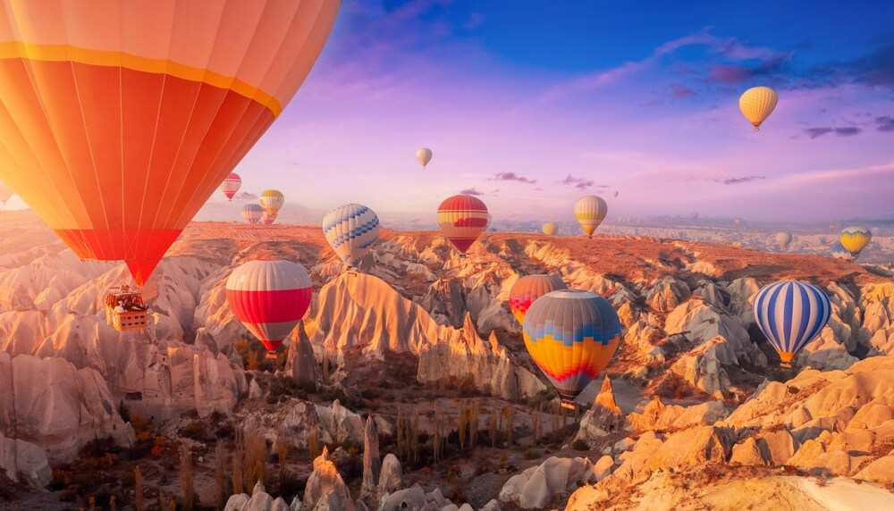 Top places to visit in the world: Hot air balloons over Cappadocia as the sun sets