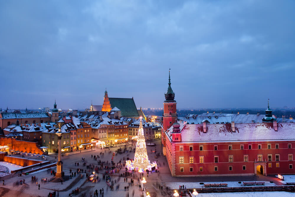 The main square in Warsaw decorated for Christmas with a large tree in the centre