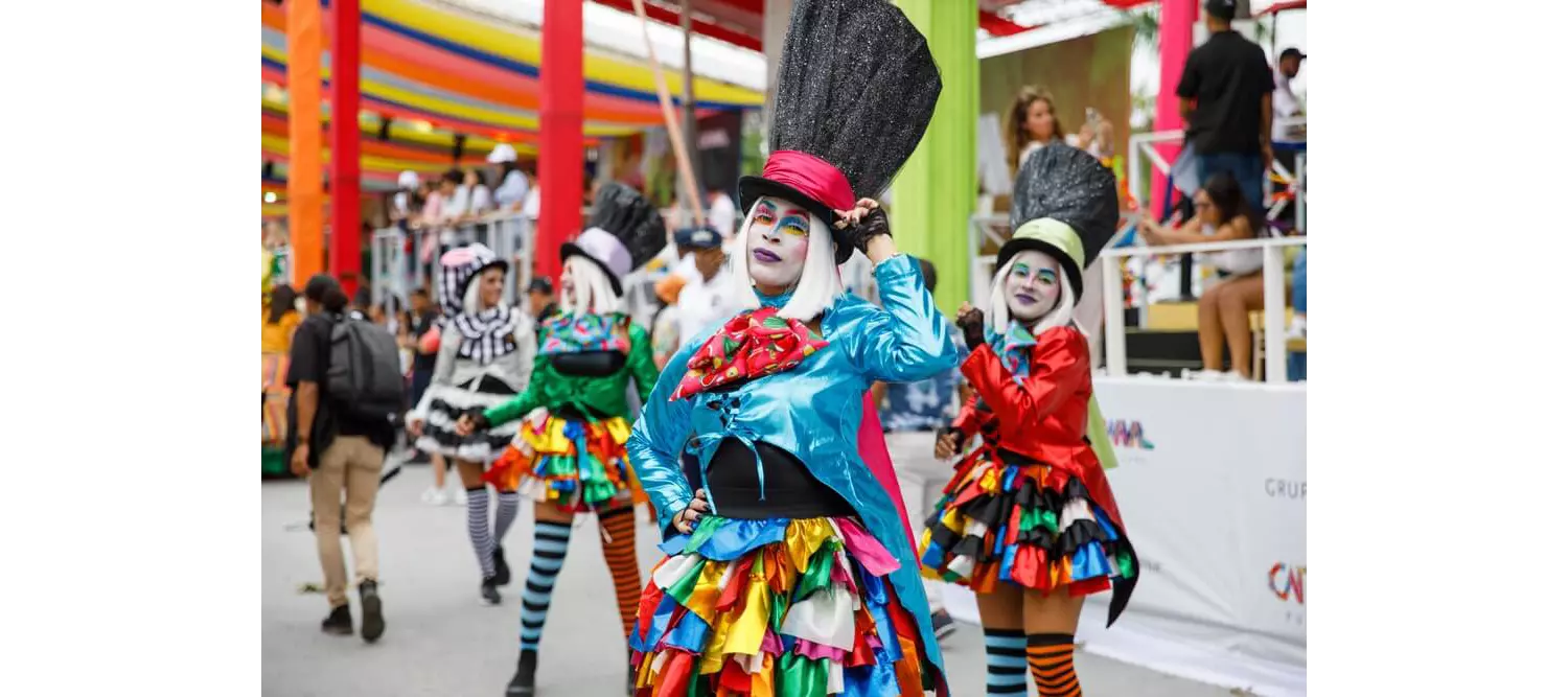 Carnival in the Dominican Republic: A group of women dressed in black top hats and colorful jackets