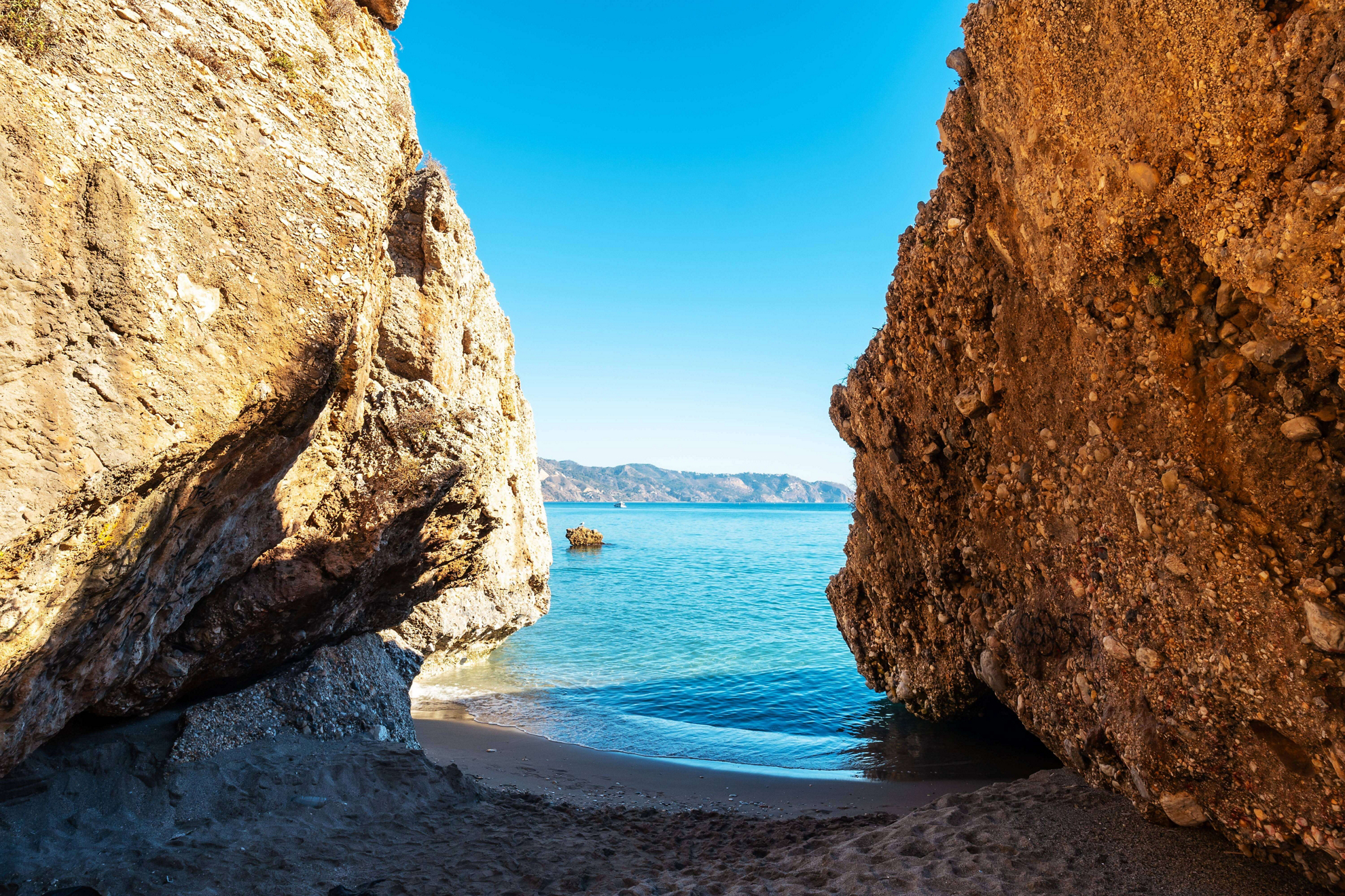 Costa del Sol Best Beaches: A slice of sand and sea between two cliffs