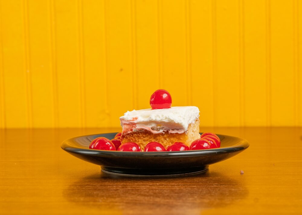 Tres Leches is a tooth-achingly sweet treat to enjoy after trying the top Dominican dishes