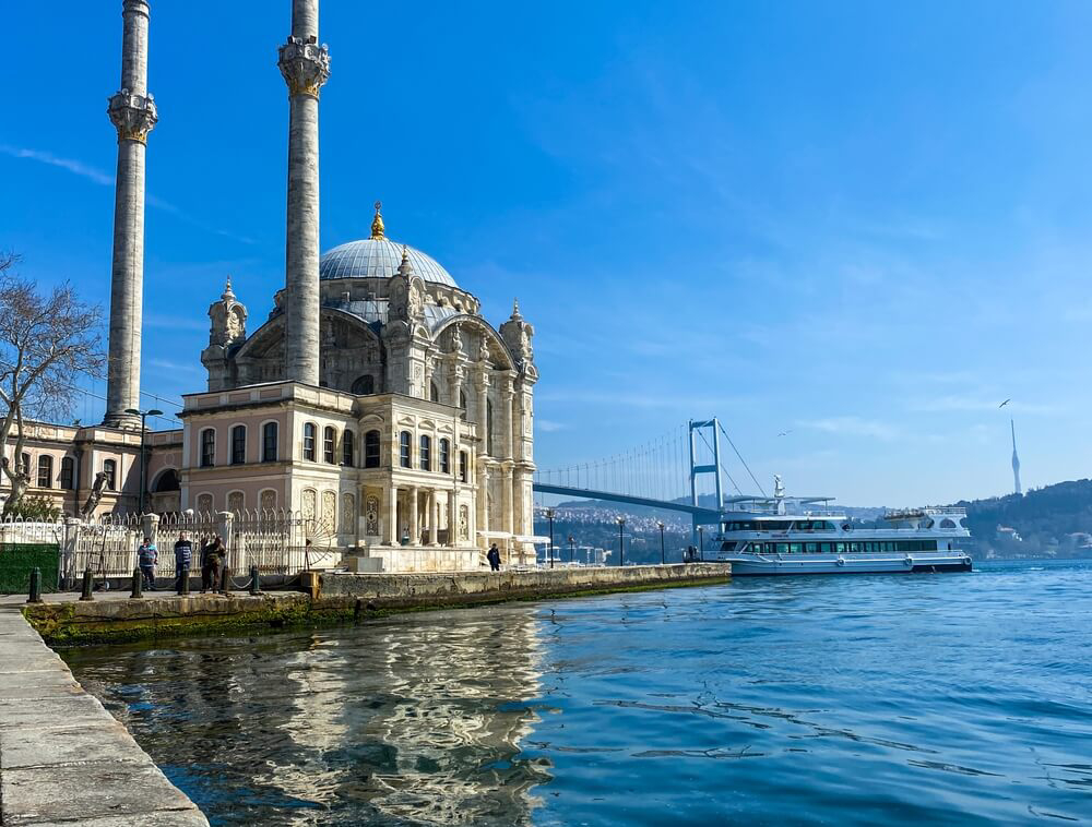 Ortaköy Mosque Istanbul: Seafront views of the mosque with a boat in the background