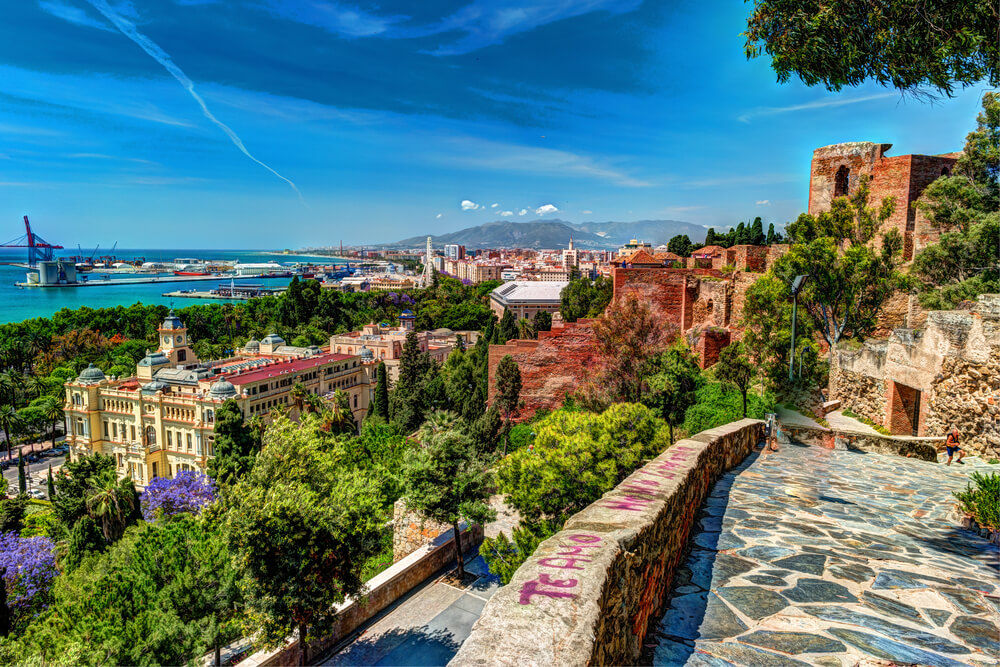 Family beach holidays: views across the city of Malaga from the Gibralfaro Castle fortress