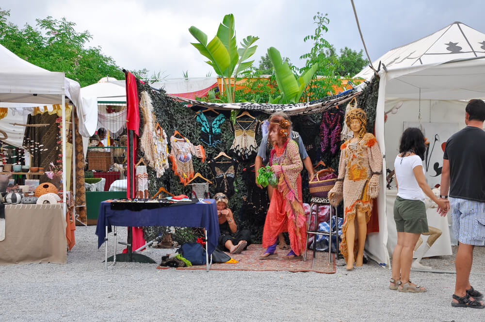 Ibiza excursions for families: Stall holders selling souvenirs in Las Dalias Hippy Market, Ibiza