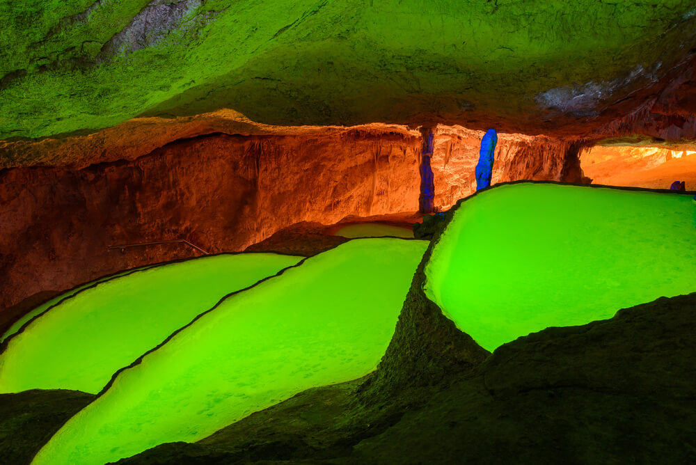 Family holidays in Ibiza: The green waters of the Can Marça caves in Ibiza