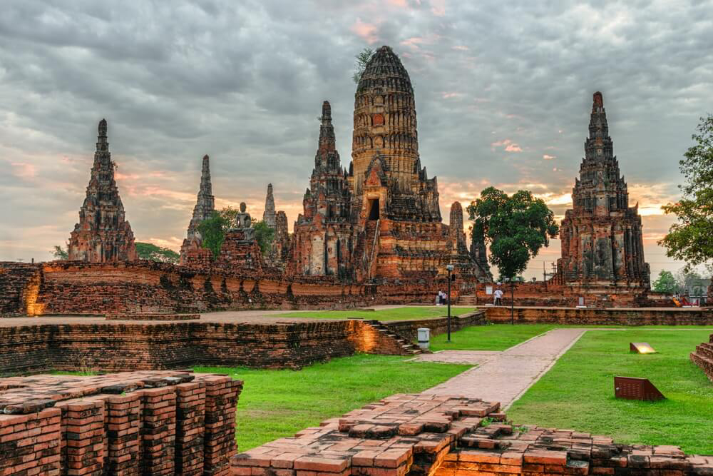 Ayutthaya: A large red brick temple surrounded by grass