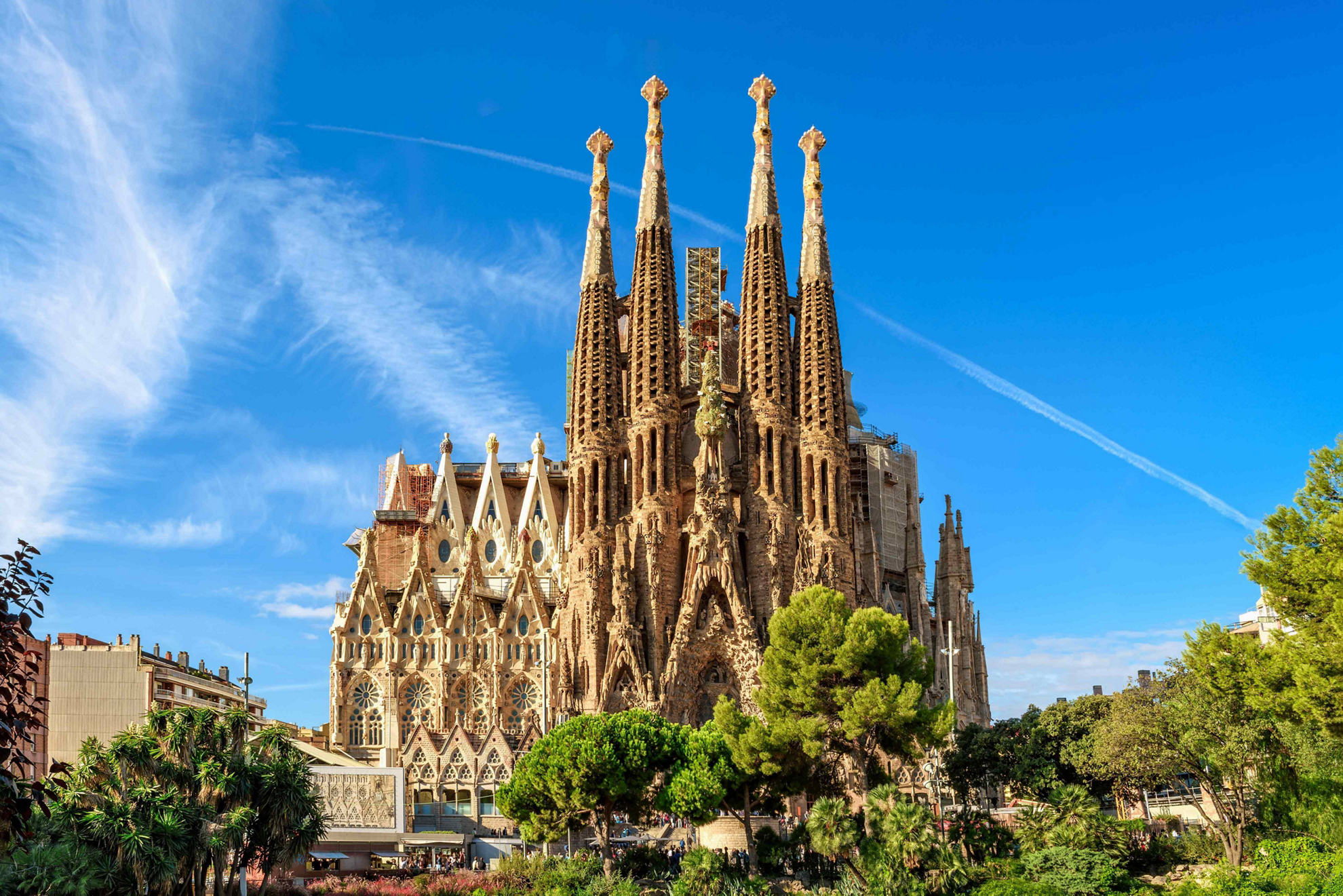 Famous Buildings in Spain: The Sagrada Familia towering above the Barcelona street