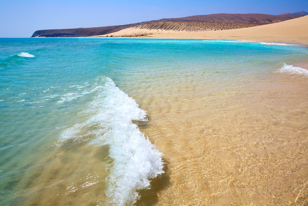 Fuerteventura holidays: Golden sand beaches with the Jandía lighthouse in the distance