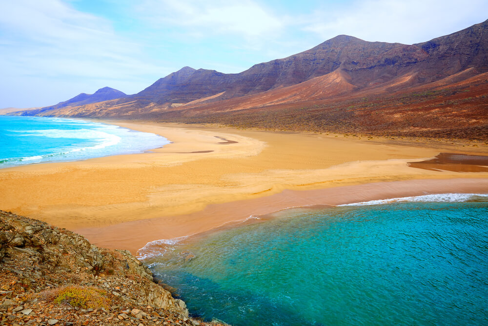 Fuerteventura holidays: The cliffs and beach of Playa Cofete, Fuerteventura