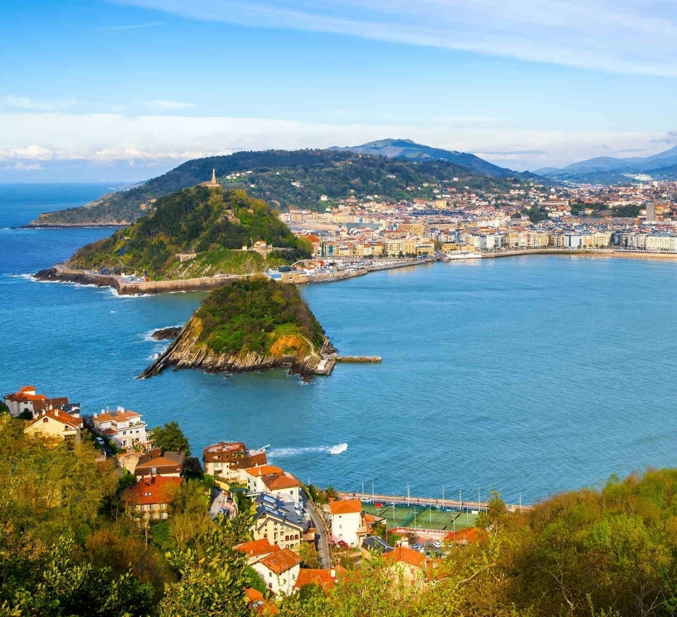 San Sebastian - Donostia city, Basque country, Spain, panoramic view with La Concha bay, Pyrenees mountains and Atlantic ocean