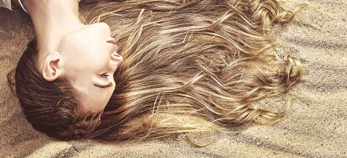 Learn about holiday hair care to stop your beach holiday damaging your hair