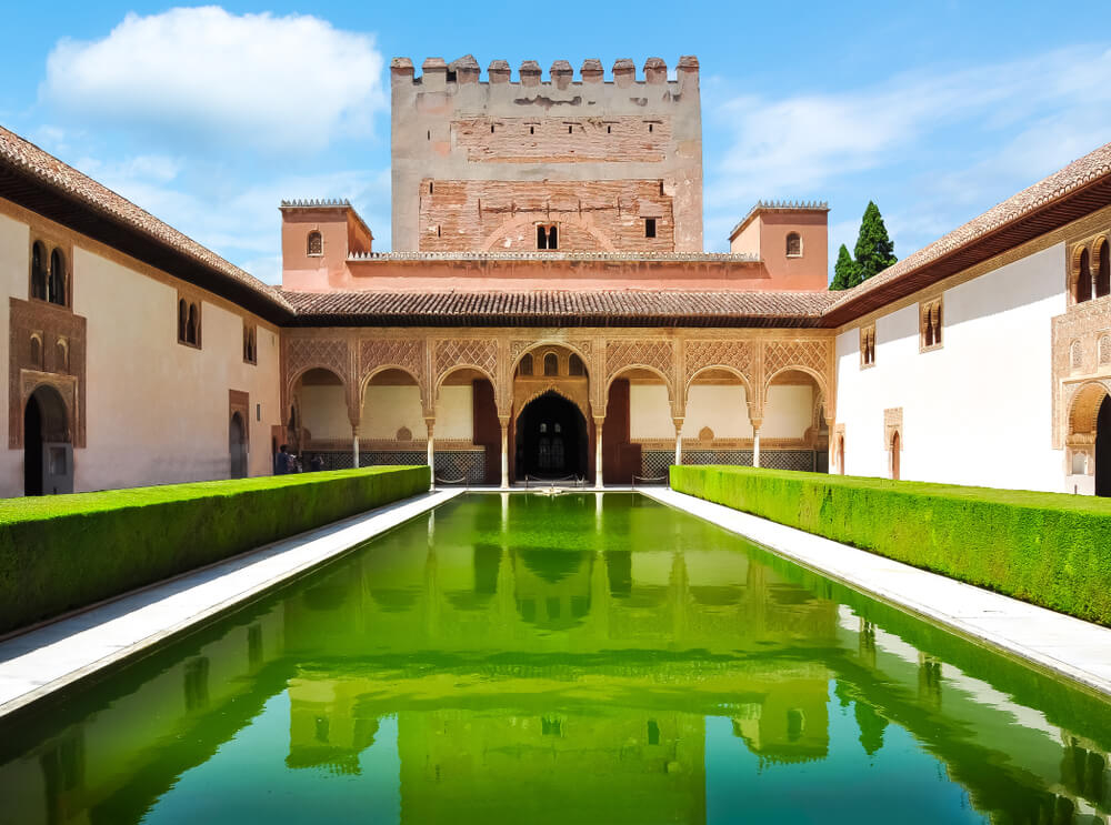 Nasrid Palaces, Granada: View of the garden and Comares Tower at the Court of the Myrtles