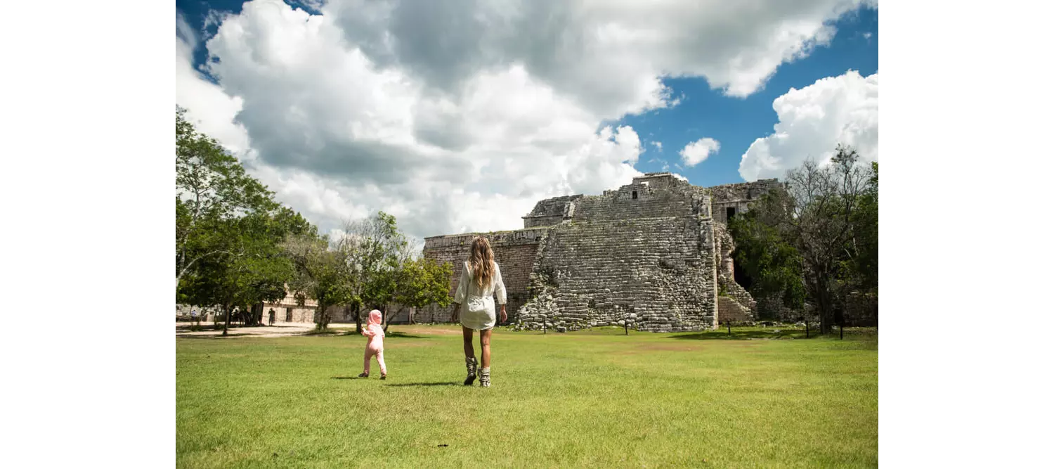 Holiday destinations with baby: Mother and child exploring Mayan ruins in Mexico