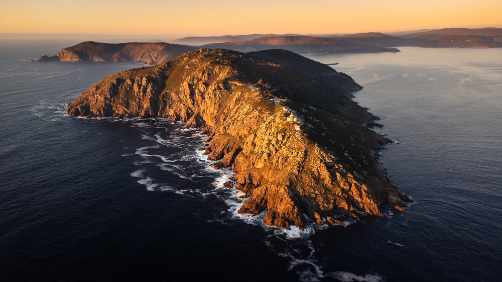 Coastline Galicia: A bird’s-eye view of Cape Finisterre at sundown