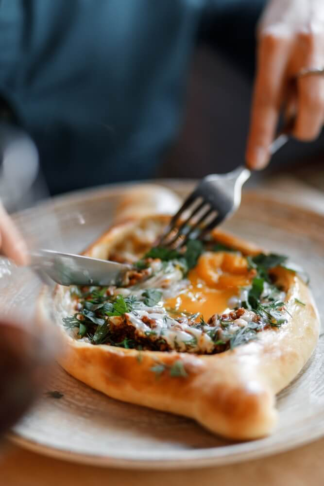 Khachapuri: A dough filled with egg and cheese