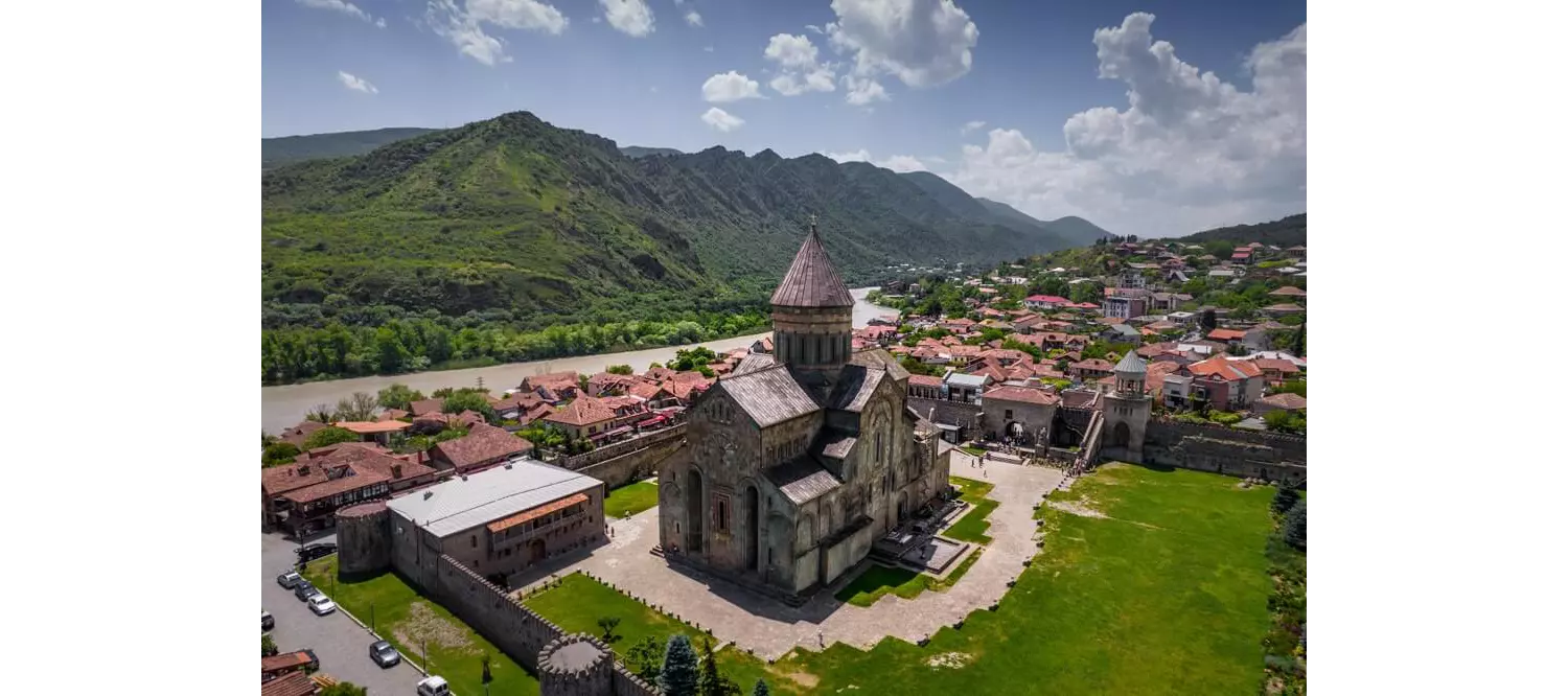 Mtskheta: A bird’s eye view of a church surrounded by green