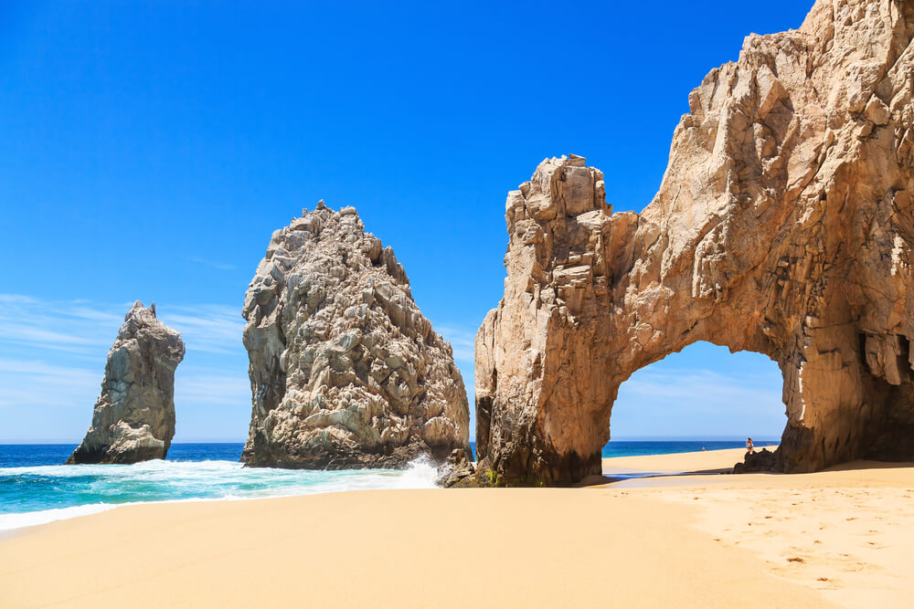 The stunning rock formation known as Los Arcos will remind you why travel makes you happy