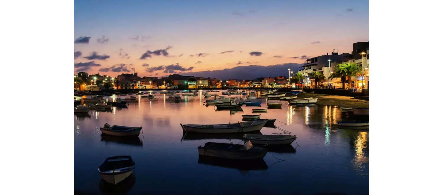 Lanzarote nightlife: The sun setting over the lake, Charco de San Gines in Arrecife