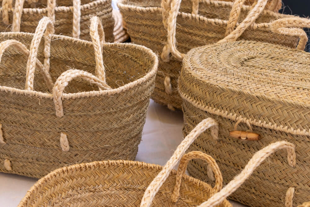 Beach bags: A market stall full of straw-woven beach bags