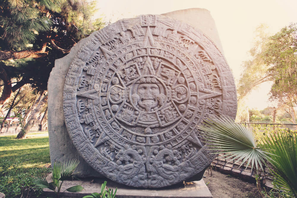 Mayan culture: A round, stone carved Mayan calendar