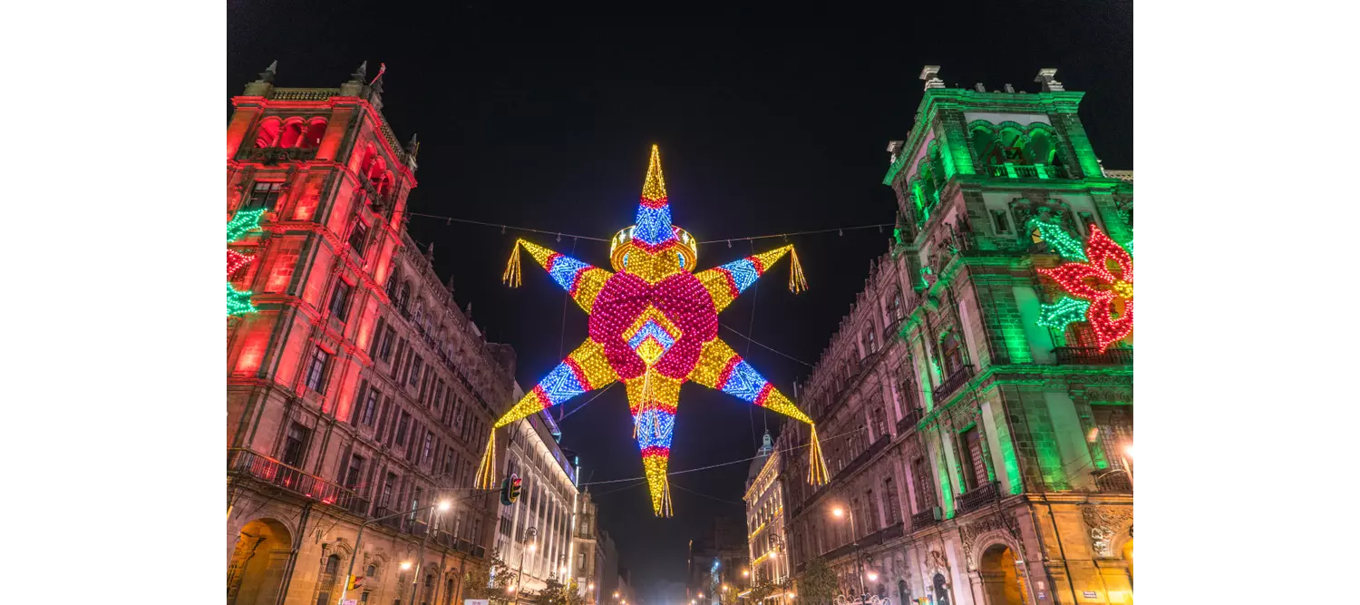 Mexican Christmas traditions: A 7 pointed piñata in a public street