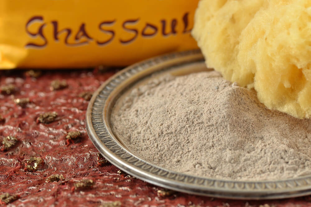 Rhassoul: A plate of beige clay powder