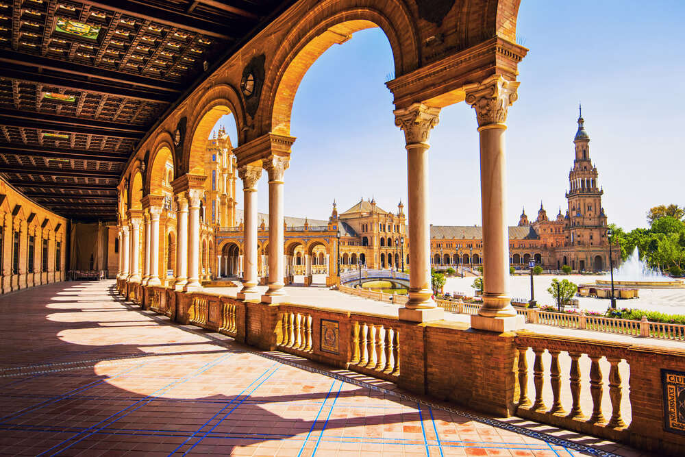 Plaza de España Seville: A close-up of the arcade building with its columns and tiled floor