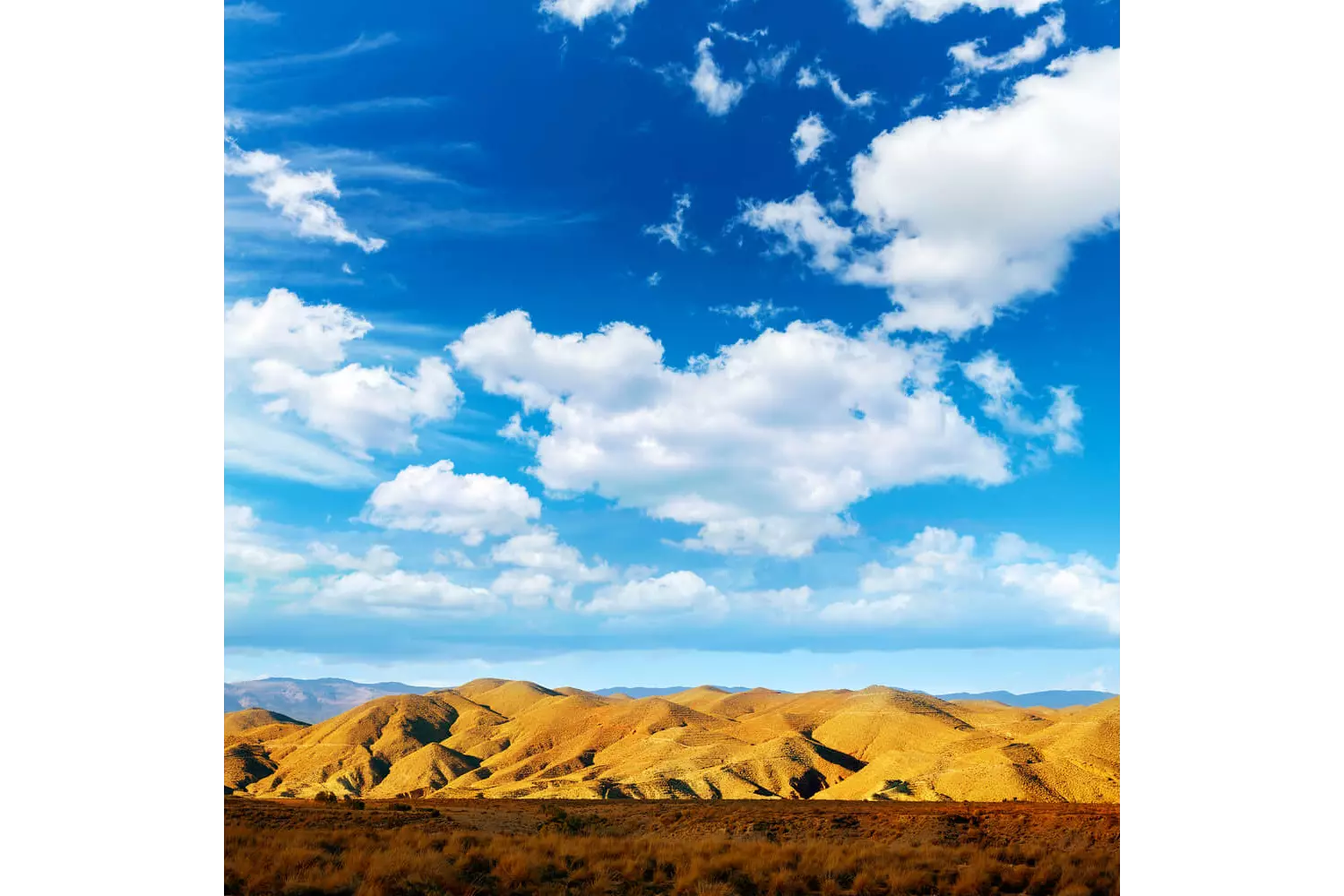 Tabernas Desert Almeria: The mountains of the desert bathed in a golden glow