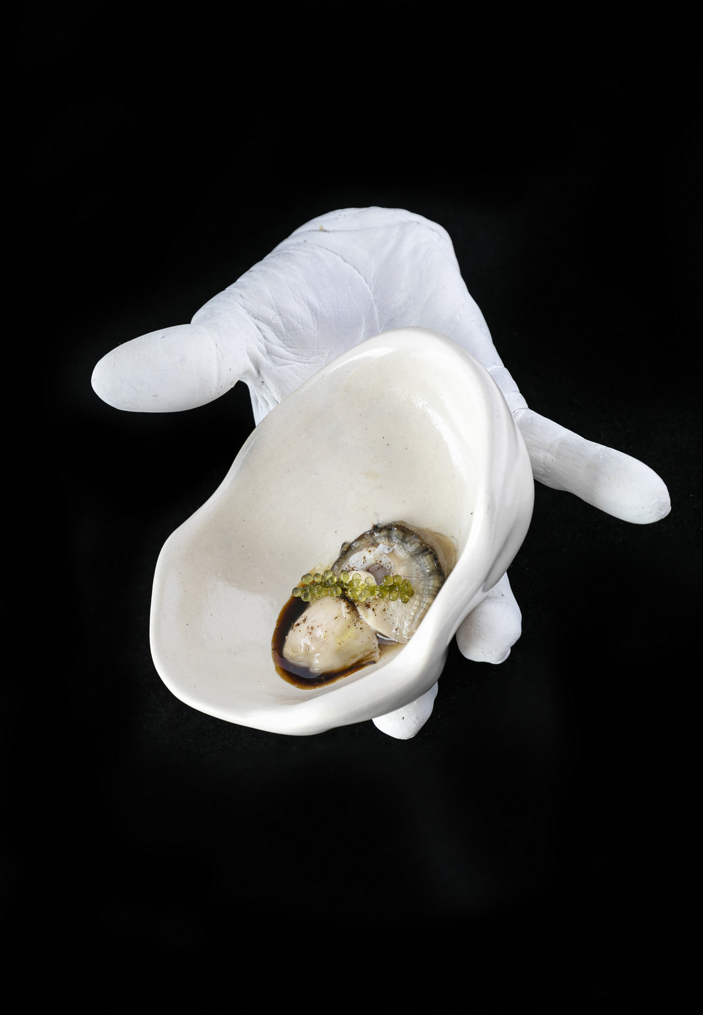 Oyster with tomato and umibudo juice